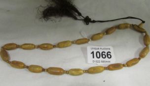 An ethnic bone bead necklace
