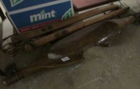 A wooden milkmaids yoke and one other item
