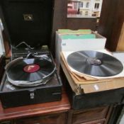 A picnic gramaphone and quantity of 78rpm records