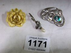 2 silver brooches and a rose brooch