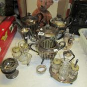 A mixed lot of silver plate teapots, cruets etc