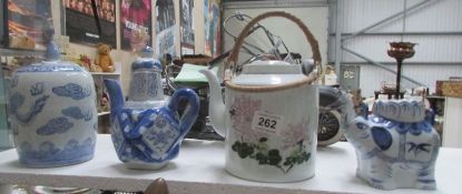 3 Oriental teapots and a lidded jar