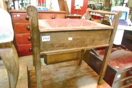 An oak piano stool