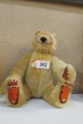 A Steiff `Dicky` teddy bear, signed on foot B Steiff family