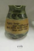 A Doulton Stoneware motto jug