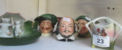 2 Royal Doulton character jugs, one other, a matchstriker and one other item