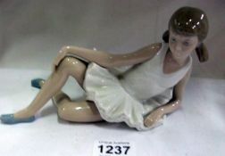 A NAO reclining ballerina