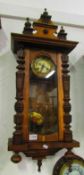 A mahogany wall clock