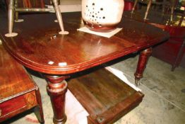 A Victorian oak extending dining table with 3 leaves (11' x4')