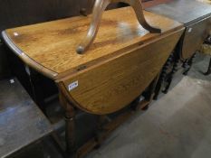 An oak gate leg table