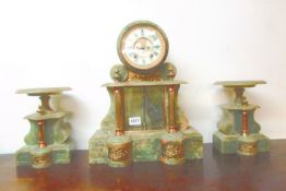 A green marble clock garniture