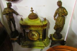 A French clock garniture with figurines, clock base a/f