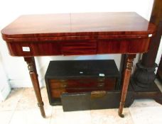 A Victorian mahogany fold over tea table