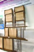 4 folding chairs with cane seats and backs