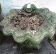 A shell bird bath