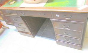 A mahogany double pedestal desk