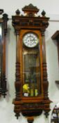 A Victorian mahogany twin weight Vienna wall clock