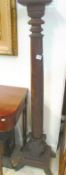 A Victorian mahogany torchere