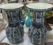 A pair of Dutch blue and white vases