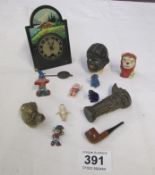 A mixed lot including miniature wall clock, pepper pots etc