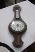 An Edwardian oak barometer, glass a/f