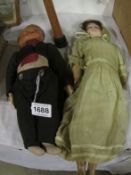 A Victorian porcelain doll and one other