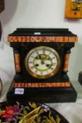 A Victorian palladian style marble mantel clock