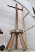 An old wooden washing dolly