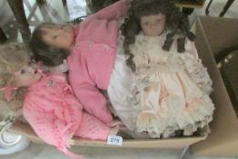 A box of porcelain dolls