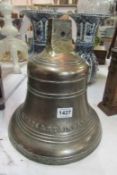 A large bronze bell stamped 'Mear's and Stainbank, London, 1922'