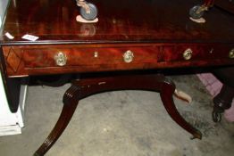 A mahogany sofa table