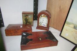 A maple box, a clock, a lock and one other box