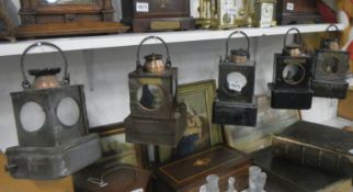 5 old railway lamps