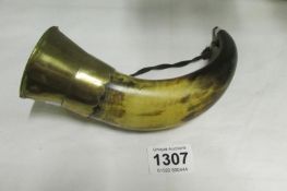 A horn with brass fittings