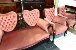 An Edwardian 3 pieces salon suite with heart shaped backs