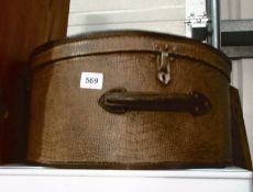 A travelling hat box
