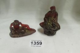2 Oriental red jade style figures