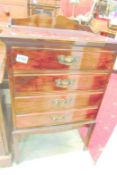 A mahogany music cabinet