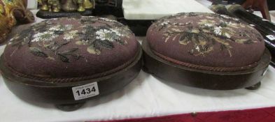 A pair of Victorian footstools with beadwork tops