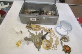 A mixed lot of costume jewellery, coins etc