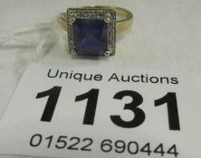 A 9ct gold ring set tanzanite and diamonds