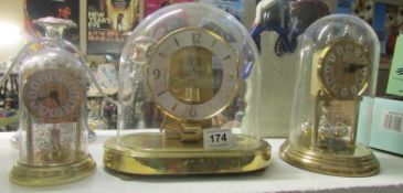 A Kundo electronic anniversary clock and 2 others