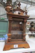 An ornate Victorian clock case