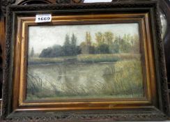 An oil painting of a lake signed Rod Parthie '35