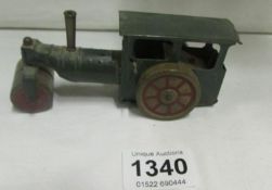 A Triang Minic clockwork tinplate steam roller