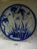 A large Japanese hand painted blue and white  plate