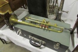 A cased Regent brass trumpet