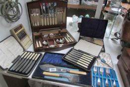 A mixed lot of cased cutlery sets