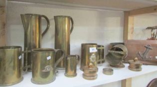 A mixed lot of brass trench art including pair of jugs, box etc