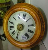 A circular pine wall clock